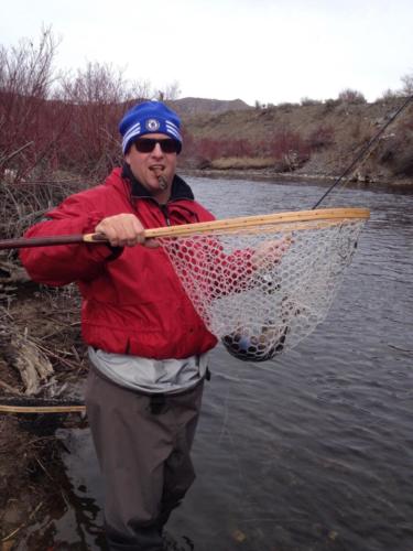 Complete with cigar, Chad Brownstein trout fishing in Park City, Utah.